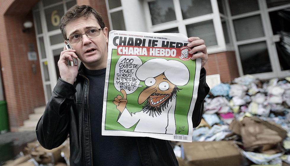 Stéphane Charbonnier, alias Charb, cuando incendiaron la redacción de Charlie Hebdo en 2011. (AFP)