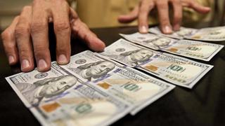 Tipo de cambio opera al alza, bancos compran dólares por vencimientos de swaps cambiarios
