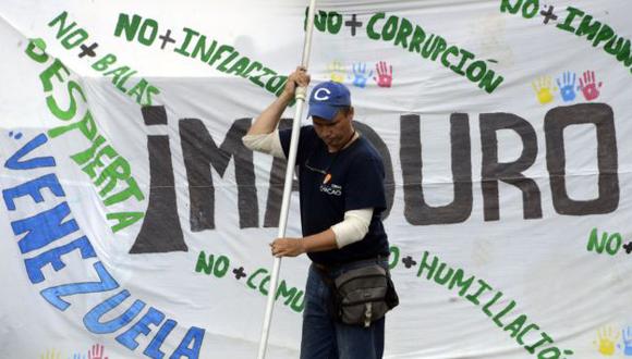 Ciudadanos de Venezuela exigen un país sin corrupción ni impunidad(AFP)