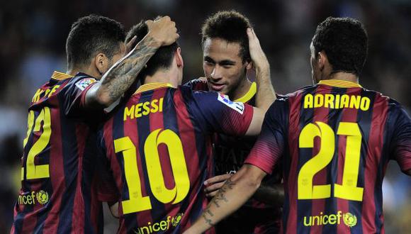 Neymar y Lionel Messi celebran un tanto del Barcelona. (AFP)
