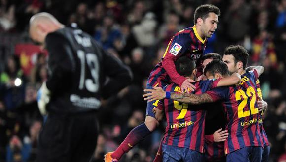 Barcelona goleó 3-0 al Málaga y recuperó el liderato de la Liga española. (AFP)
