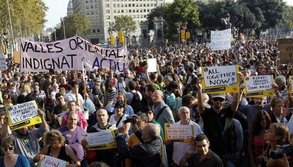 GRITO INDIGNADO. Las masivas protestas callejeras expresan el malestar de españoles ante la crisis. (EFE)