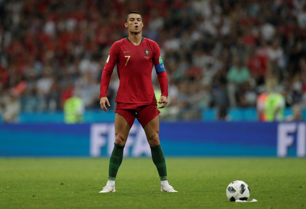 Con 'hat-trick' de Ronaldo, Portugal empató sobre la hora ante España en su debut por el grupo B del Mundial. (REUTERS)