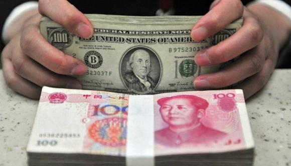 Economía china se beneficiará con esta decisión del FMI. (EFE)