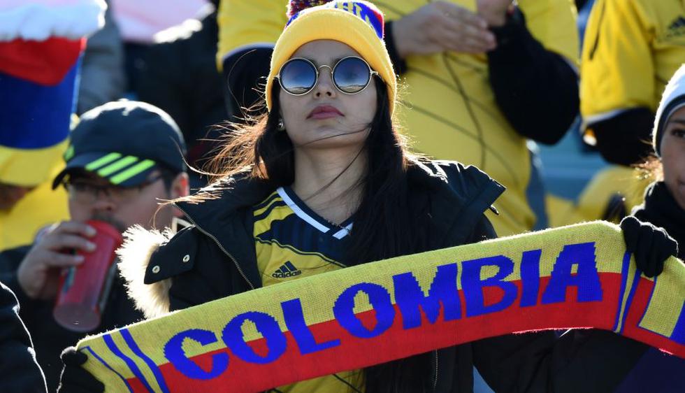 Las hinchas de Colombia y Venezuela  estuvieron presentes en el encuentro. (AFP)