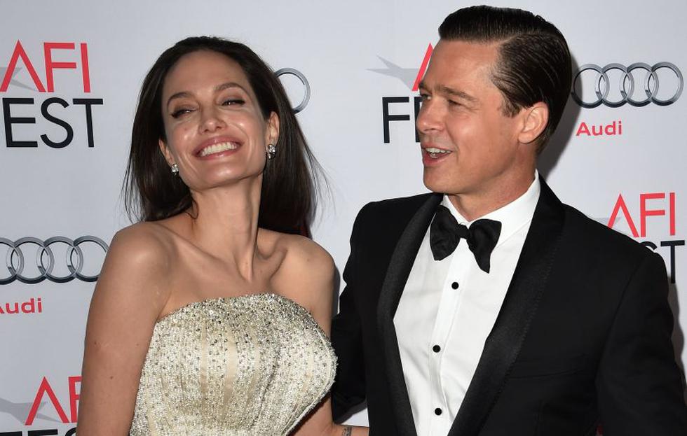 Angelina Jolie y Brad Pitt más felices que nunca en el preestreno de Frente al Mar. (EFE)