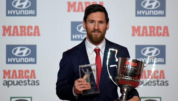 Messi recibió los trofeos Pichichi y Alfredo Di Stéfano de los 'Premios Marca del Fútbol', por máximo goleador y mejor jugador de la Liga, respectivamente. (AFP)
