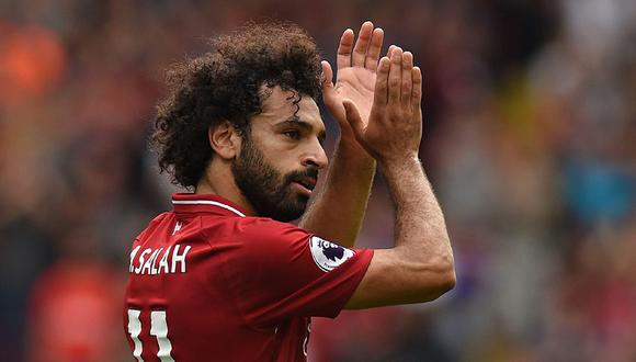 Mohamed Salah y su gesto con pequeño hincha del Liverpool. (Foto: AFP)