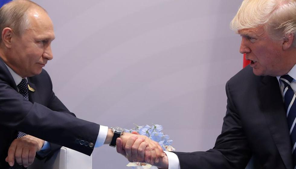 &quot;Es un honor reunirme con usted&quot; le dijo Trump a Putin. (AFP)