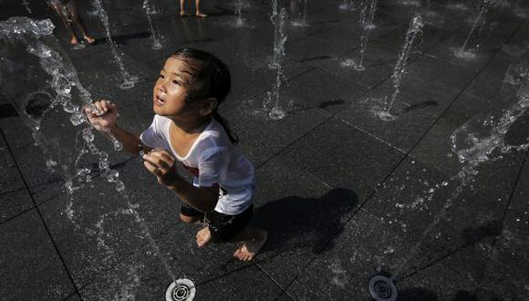 Ola de calor cobra primeras víctimas en China. (AP)