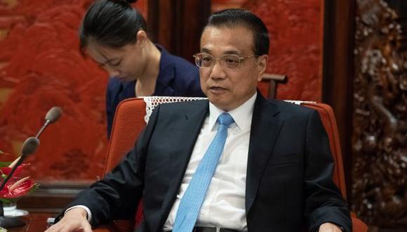 Li Keqiang desmintió este miércoles que China devalúe deliberadamente su moneda para ayudar a sus exportadores. (Foto: AFP)