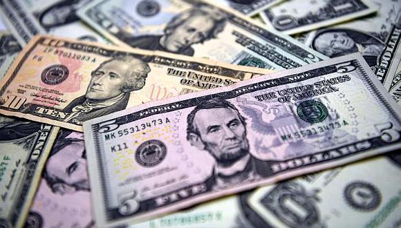 El dólar se vendía a S/3.390 en el mercado paralelo este jueves. (Foto: AFP)