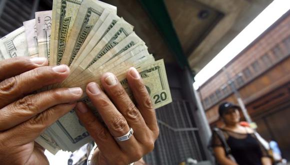 FUTURO. Bancos prevén que dólar cerraría el año en S/.2.65. (Alberto Orbegoso)