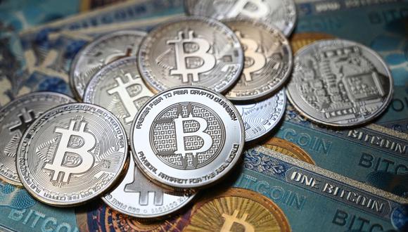 Sepa como los Bitcoin pueden darte mayor rentabilidad que el banco (Photo by Ozan KOSE / AFP)
