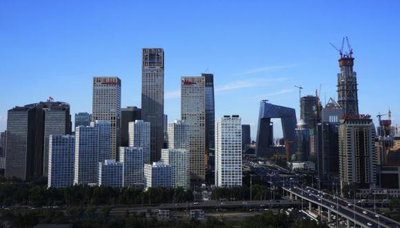 PBI de China sería de 6.6% este año y 6.5% en el 2017, según sondeo. (Beijing|AP)