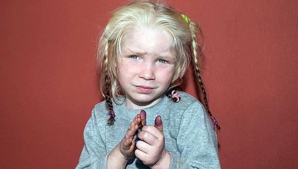 Interpol publicó foto de "María" con la esperanza de dar con sus padres. (AFP)