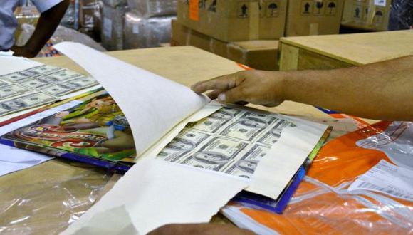 Sunat incautó 70 mil dólares falsos ocultos en libros infantiles. (Foto:Sunat)