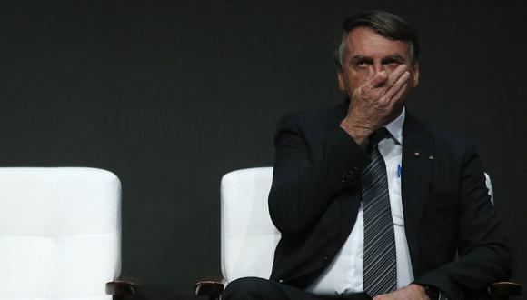 El presidente brasileño, Jair Bolsonaro, gesticula durante la Conferencia Brasileña del Acero, en Sao Paulo, Brasil, el 23 de agosto de 2022. (Foto de Miguel SCHINCARIOL / AFP)
