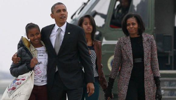 CUATRO AÑOS MÁS. La familia Obama dejó Chicago y retornó ayer a la Casa Blanca. (Reuters)
