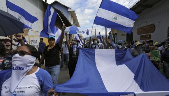 Manifestantes antigubernamentales participan en una marcha apodada "Nicaragua unida nunca será derrotada" en Granada. (Fuente: AFP)