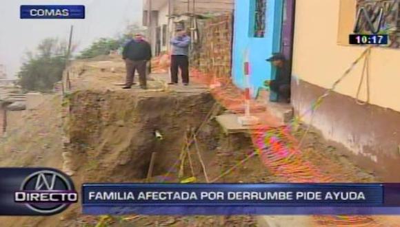 Derrumbe de muro de contención destruyó varias viviendas en Comas. (Captura de video)