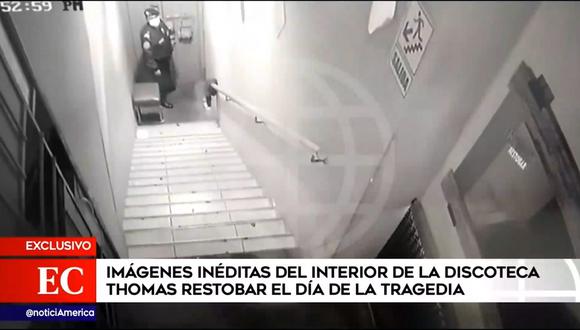 Un policía se encuentra en la puerta el día de la tragedia en discoteca de Los Olivos. (Foto: América Noticias)