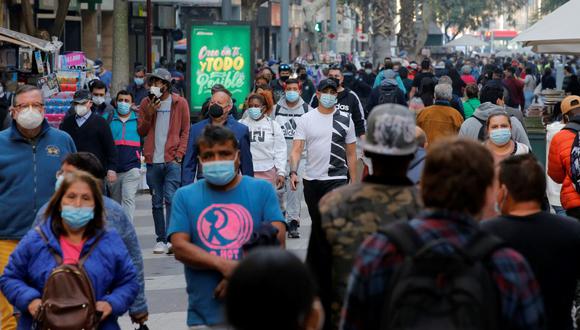 Chile recupera parcialmente la normalidad y disfruta de más libertades que nunca desde la llegada del virus, después de tres meses de una segunda ola que puso contra las cuerdas al sistema sanitario entre marzo y junio. (JAVIER TORRES / AFP).