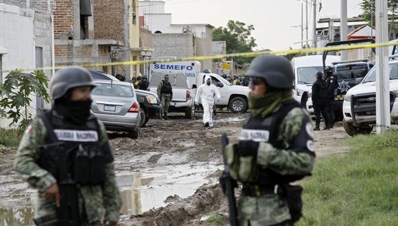 Militares resguardan la escena del crimen. (Foto: MARIO ARMAS / AFP).