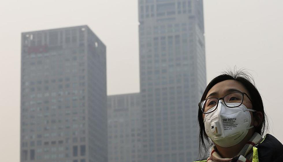 China: Pekín emite su primera alerta roja por contaminación del aire. (AP)