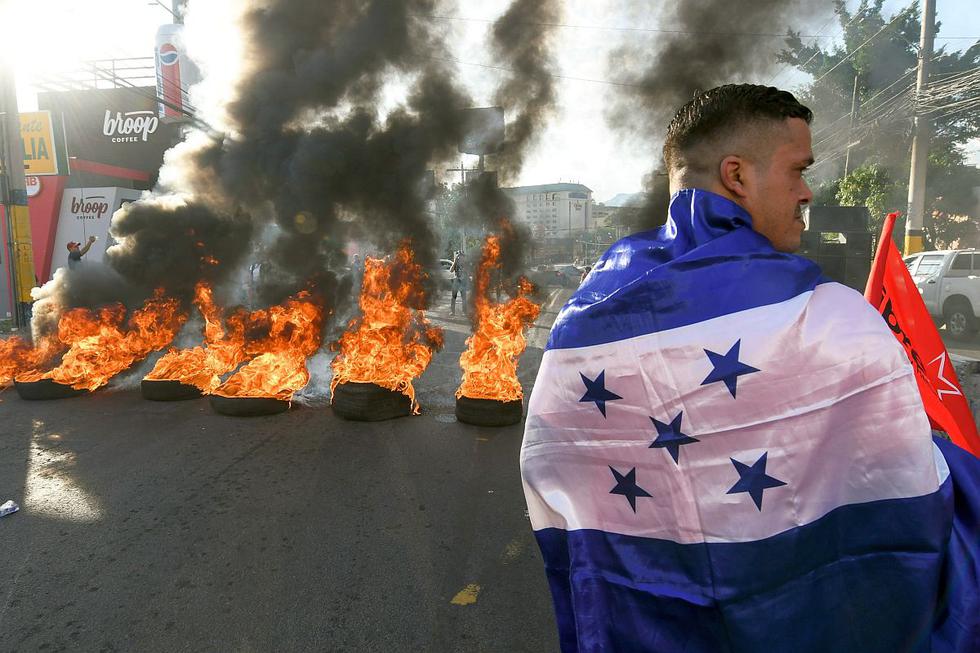 Ciudadanos de Honduras protestan para exigir la renuncia del presidente  Juan Orlando Hernández. (Foto: AFP)