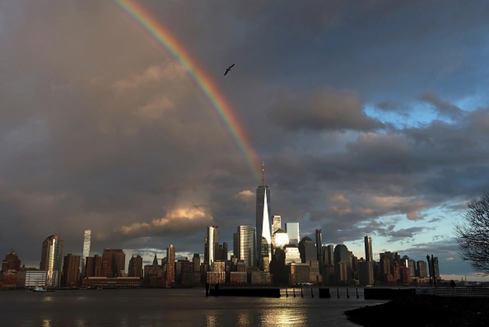 JERSEY CITY, NJ - APRIL 13: A rainbow forms in the sky over One World Trade Center and lower Manhattan as the sun sets in New York City on April 13, 2020 as seen from Jersey City, New Jersey. (Photo by Gary Hershorn/Getty Images)