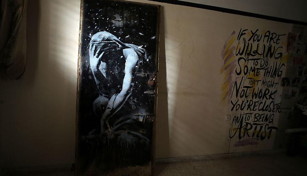 Palestino vendió un graffiti de Banksy por US$174. (AFP)