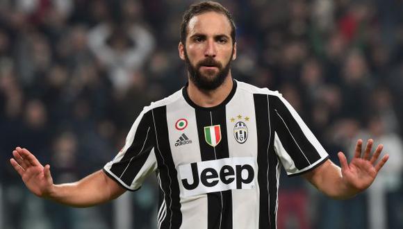 Gonzalo Higuaín le dio la victoria a Juventus 2-1 sobre Napoli, pero no celebró. (AFP)