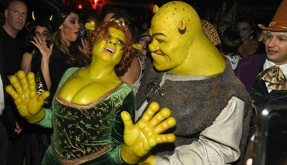 Heidi Klum y Tom Kaulitz se disfrazaron de Fiona y Shrek respectivamente. (Foto: AFP)