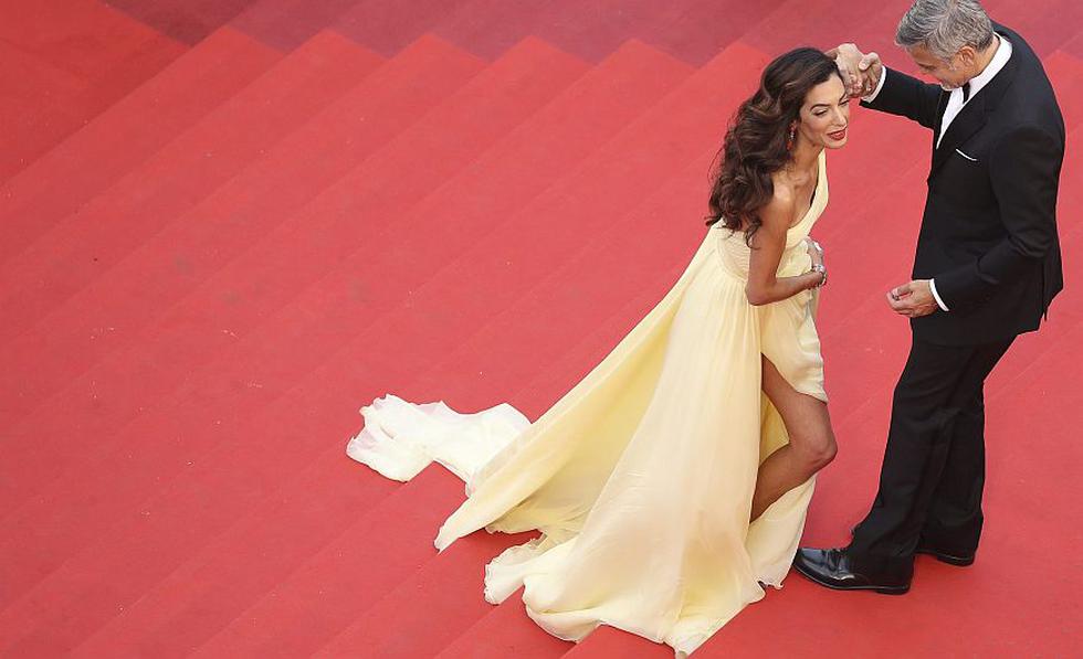 George Clooney: Su esposa sufrió un percance con su vestido en la alfombra roja de Cannes. (EFE)