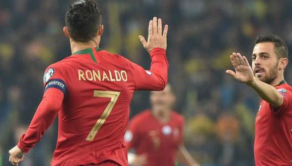 Cristiano Ronaldo y Bernardo Silva en la selección de Portugal. (Foto: AFP)