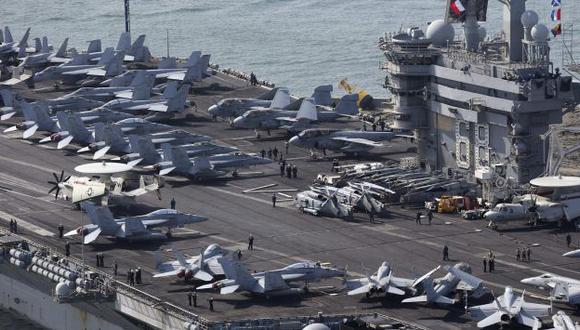 Las armas. EE.UU. lleva a la península poderoso portaaviones. (Reuters)