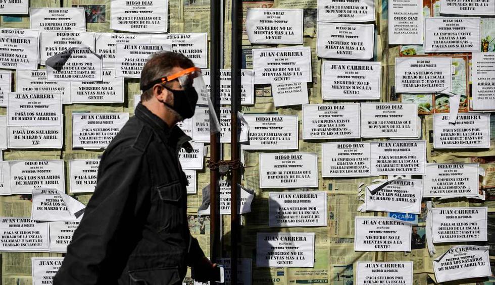 Según un estudio de la Federación de Comercio e Industria de la Ciudad de Buenos Aires (Fecoba), al menos 18% de los 110.000 negocios de la capital ha cerrado desde que comenzó la pandemia. (AFP / RONALDO SCHEMIDT).