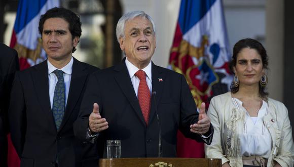 "Con esto estamos respondiendo con hechos y no solamente con buenas intenciones a lo que la gente ha demandado con tanta fuerza", sostuvo ante los medios Piñera. (Foto: AFP)