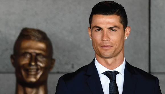 Cristiano Ronaldo dice que se siente halagado y feliz. (AFP)