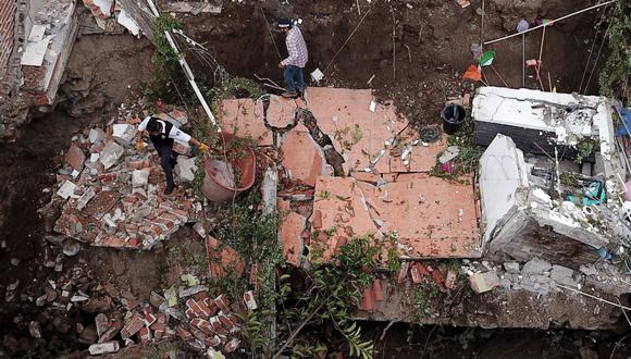 Vista aérea de una casa que se derrumbó tras el terremoto de ayer en Colima, estado de Colima, México, el 20 de septiembre de 2022. (Foto de ULISES RUIZ / AFP)