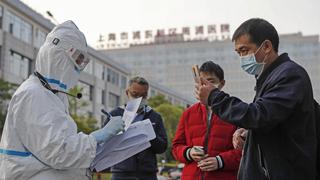 En la escuela, en la oficina y en la calle, China multiplica los tests del coronavirus [FOTOS]