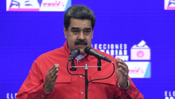 "Colombia aquí está Venezuela, Venezuela te espera Colombia, por encima de torpezas políticas, de diferencias entre gobiernos, debe prevalecer la economía", dijo Nicolás Maduro. (Foto: Federico PARRA / AFP)