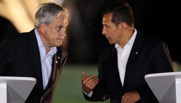 NUEVA ETAPA. En varias oportunidades, Humala y Piñera se comprometieron a ejecutar la resolución de La Haya. (EFE)