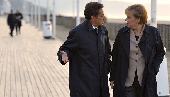 Sarkozy y Merkel coincidieron en que será un año complicado para la Eurozona. (AP)