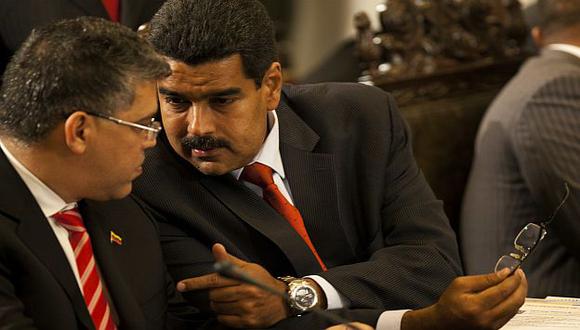 Jaua y Maduro durante un acto público. (AP)