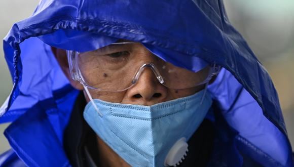 China cuenta casi 100 casos nuevos de coronavirus en un día, aunque la gran mayoría son casos importados. (Foto: AFP/Héctor RETAMAL)