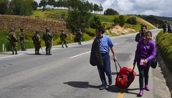Algunos peruanos no han podido ser contactados por el consulado debido a que se encuentran en la carretera. (AFP)