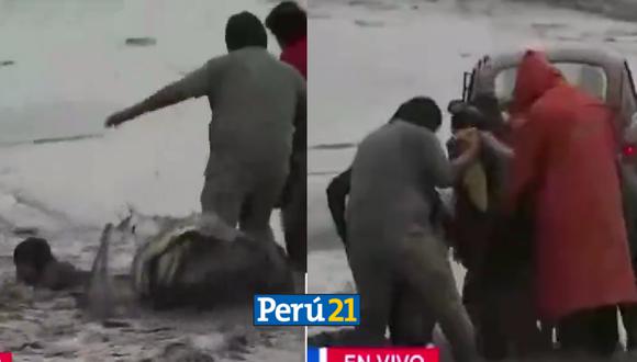 Vecinos ayudan a mujer arrastrada por un huaico, en Ñaña. (Imágenes: TV Perú Noticias)