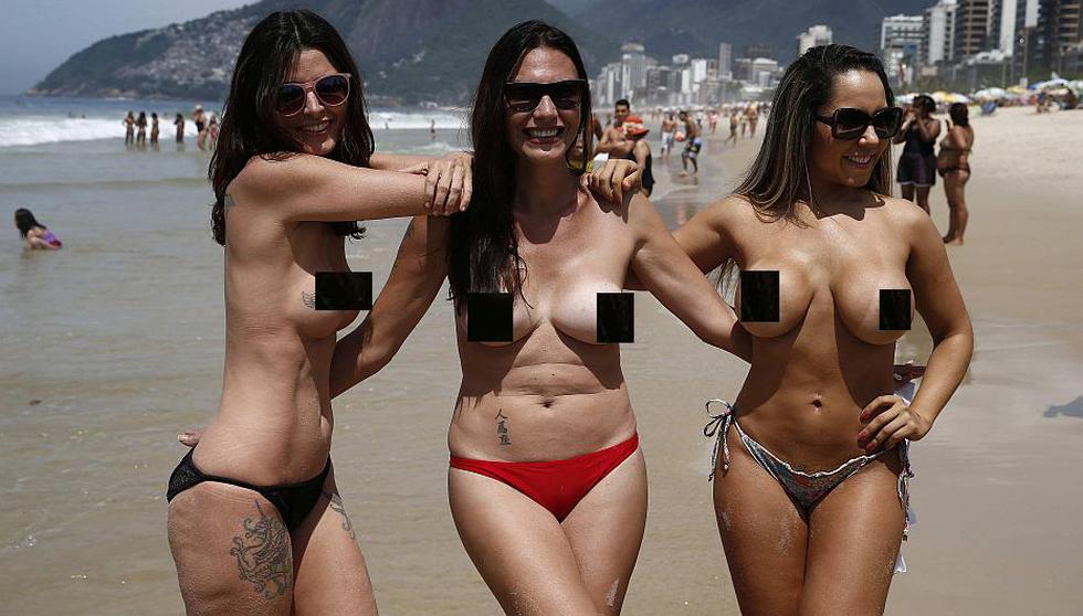 Brasil: Mujeres hicieron toples para  sensibilizar sobre el cáncer de mama. (EFE)